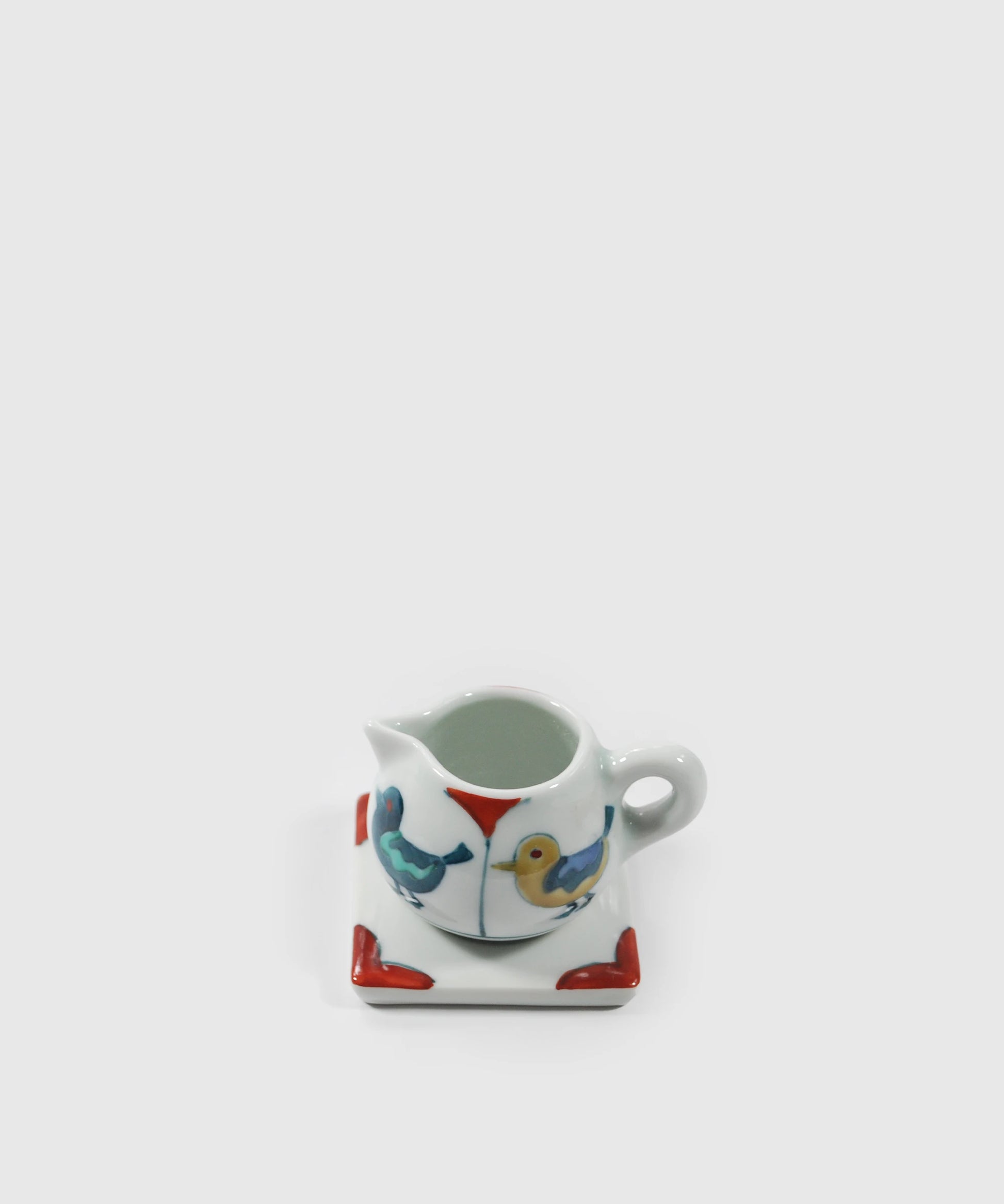 Bird-Milk-Jug-with-Saucer