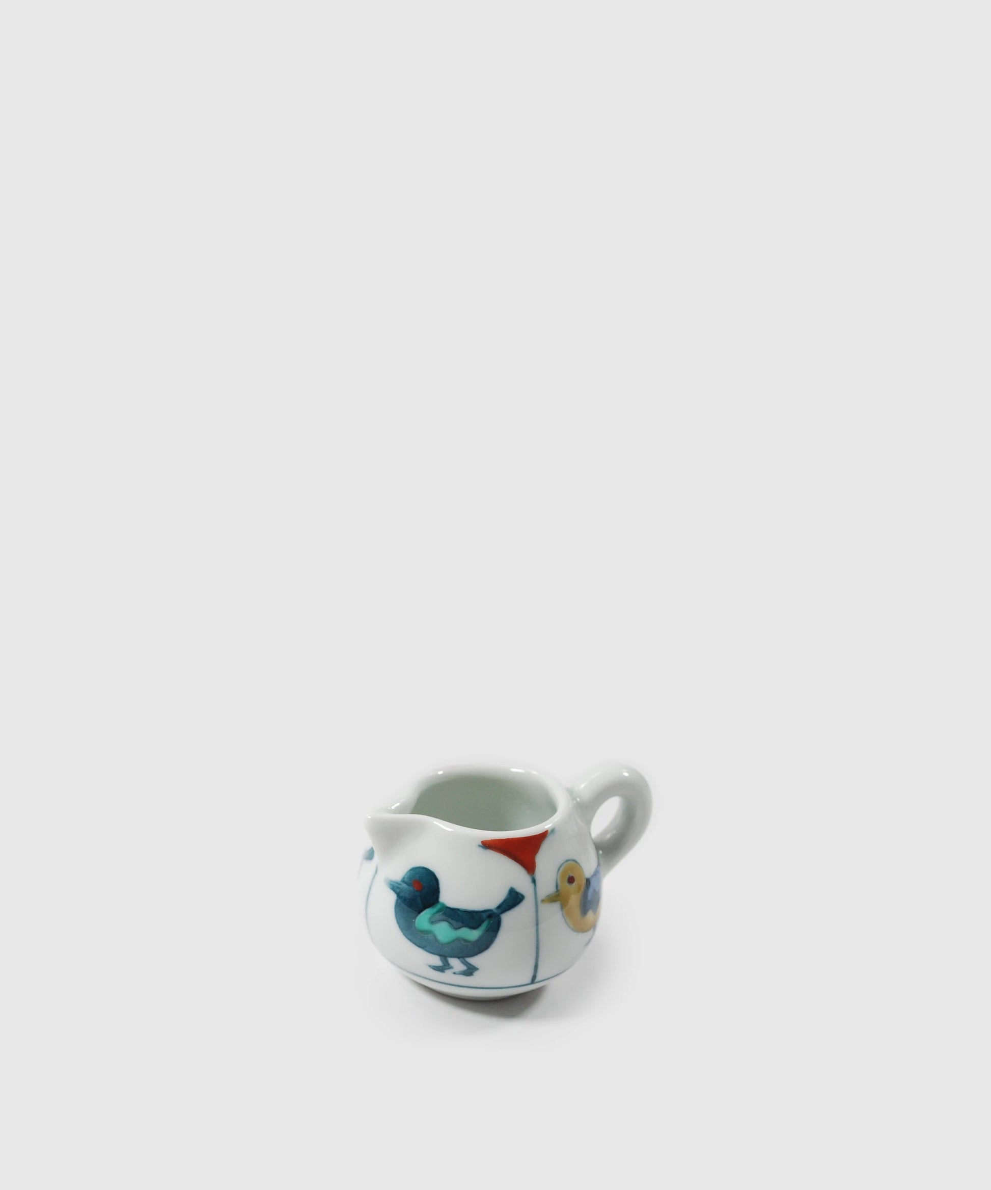 Bird-Milk-Jug-with-Saucer