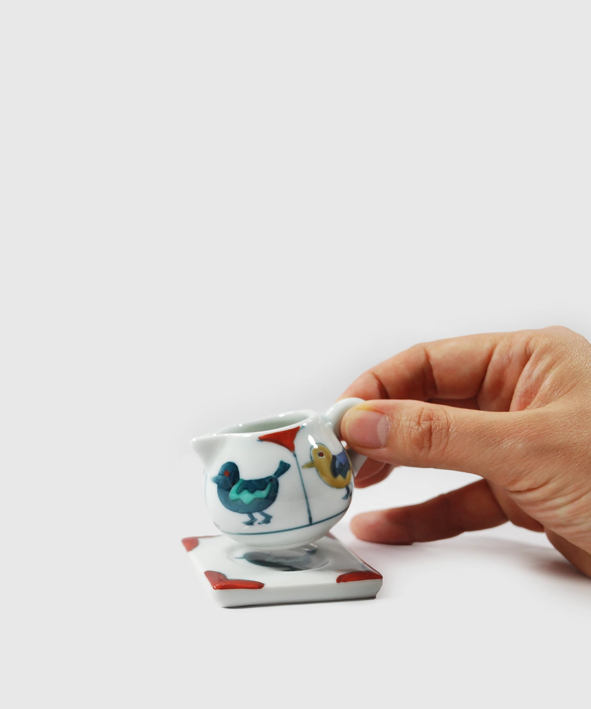 Bird-Milk-Jug-with-Saucer